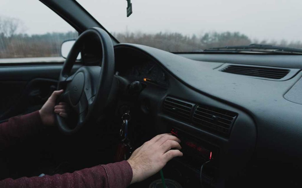 Driver tuning radio is an example of distracted driving