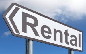 Car Rental Sign - Drivers must take precaution to avoid a car rental accident