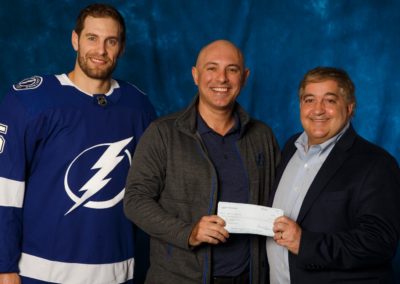 Tampa Bay Lightning Community Hero Marcus Fernandez of Kinney, Fernandez & Boire with Tampa Bay Lightning owner Jeff Vinik