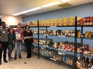 A group of volunteers in the Metropolitan Ministries food bank.