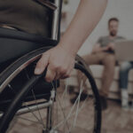 person in wheelchair seeks guidance on how to increase settlement value from personal injury lawyer
