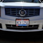 Snowbird driving - Ohio license plate on Cadillac