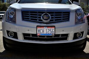 Snowbird driving - Ohio license plate on Cadillac